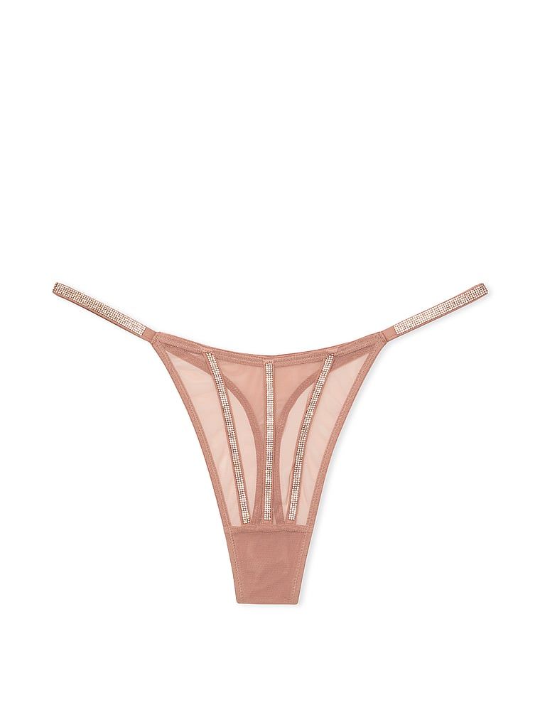 Stringi z błyszczącymi paseczkami Sheer Shine. Produkt ma kolor beżowy i pochodzi z kolekcji Very Sexy. 