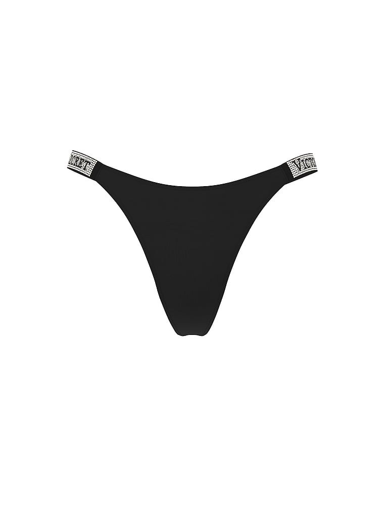 Stringi z błyszczącymi paskami Shine Strap. Produkt ma kolor czarny i pochodzi z kolekcji Very Sexy. 