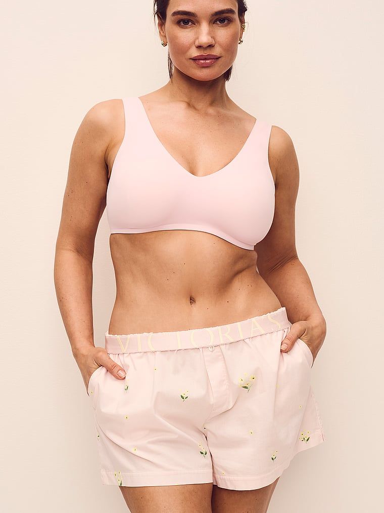 Biustonosz na co dzień i do spania SlumberBra. Produkt ma kolor różowy i pochodzi z kolekcji T-shirt. 