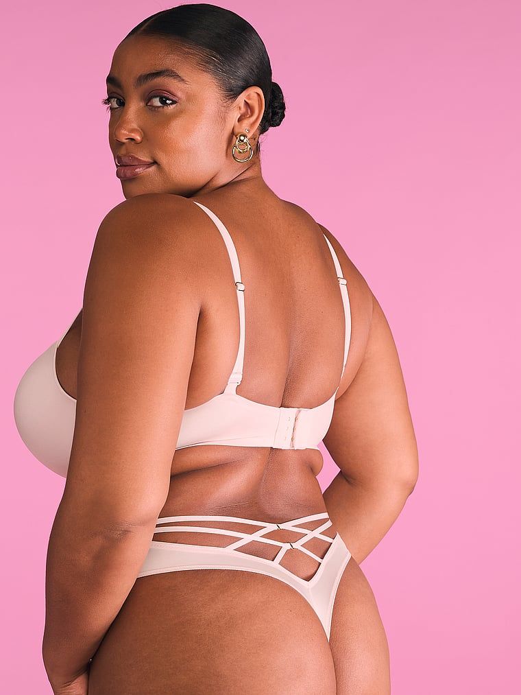 Stringi z wysokim stanem i paseczkami z tyłu Strappy-Back. Produkt ma kolor różowy i pochodzi z kolekcji Very Sexy. 