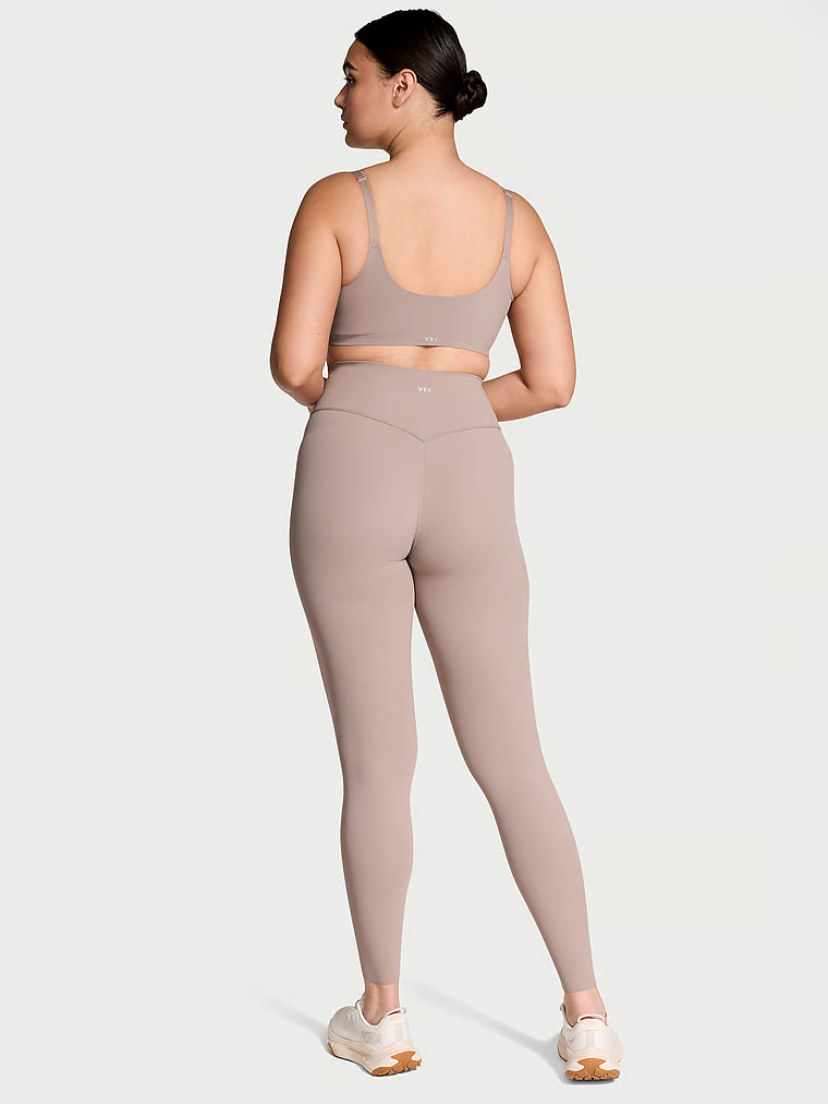 Legginsy z niską kompresją VS Elevate. Produkt ma kolor beżowy i pochodzi z kolekcji VSX. 