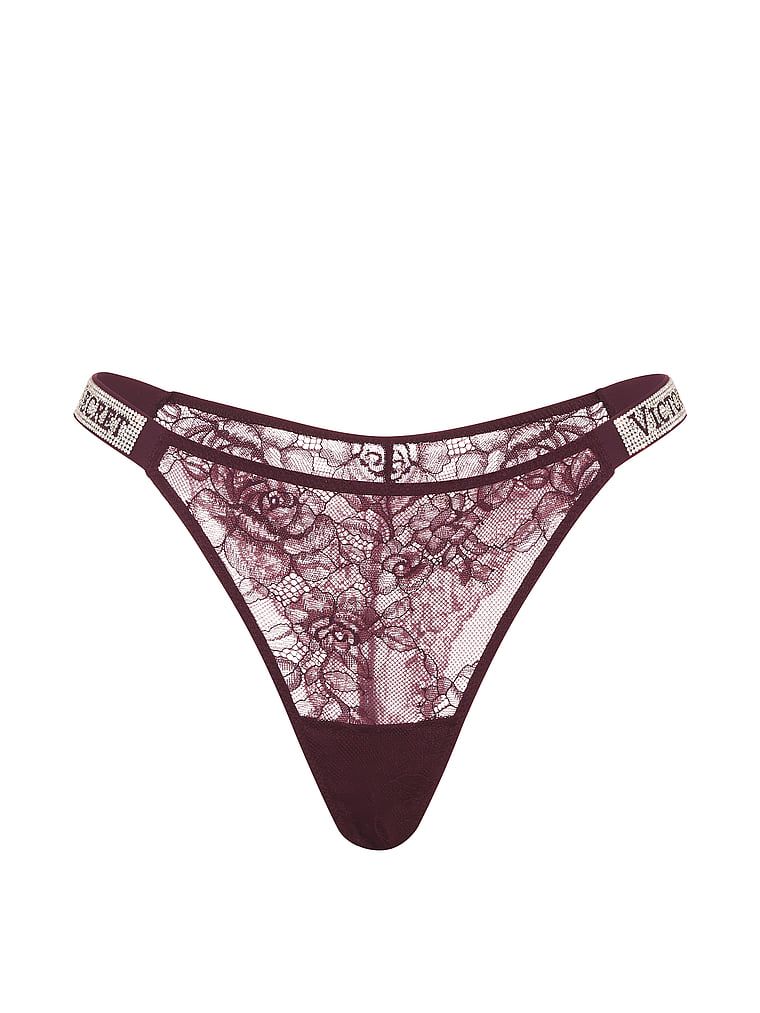 Majtki brazyliany koronkowe z błyszczącymi paskami Shine Strap Brazilian. Produkt ma kolor fioletowy i pochodzi z kolekcji Very Sexy. 