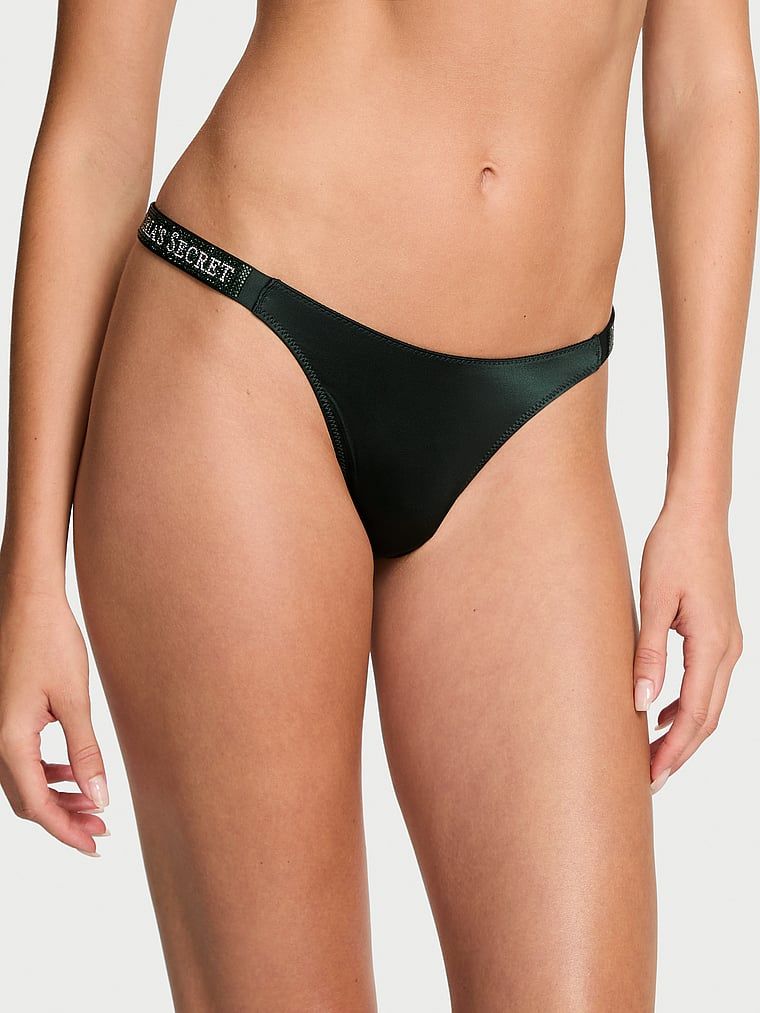 Stringi z błyszczącymi paskami Shine Strap. Produkt ma kolor zielony i pochodzi z kolekcji Very Sexy. 