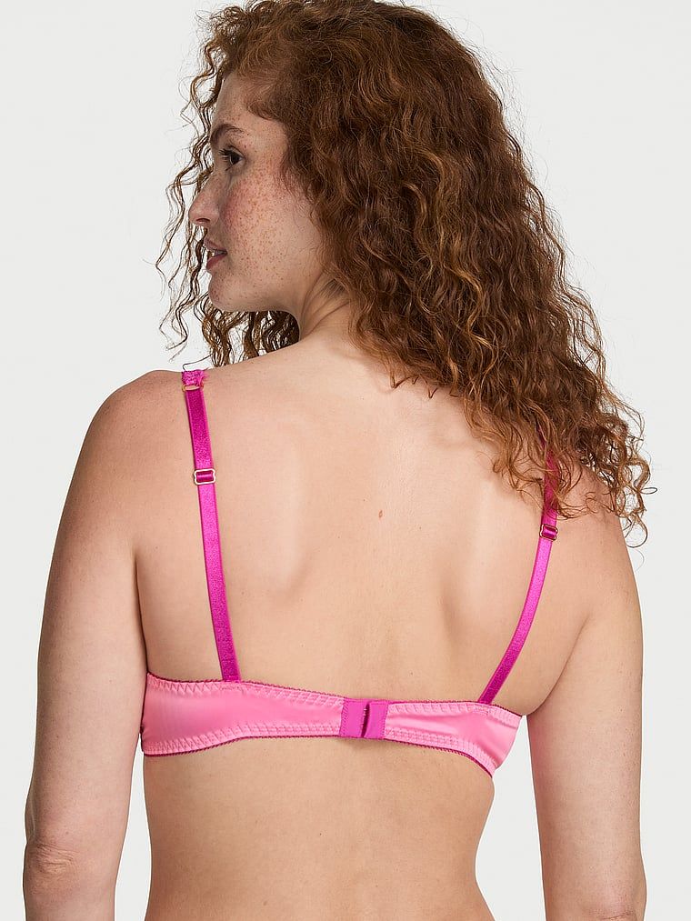 Biustonosz nieusztywniany bez fiszbin satynowy Tease. Produkt ma kolor różowy i pochodzi z kolekcji Victoria's Secret. 