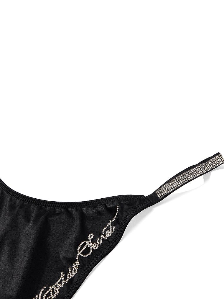 Stringi Shine Script. Produkt ma kolor czarny i pochodzi z kolekcji Very Sexy. 