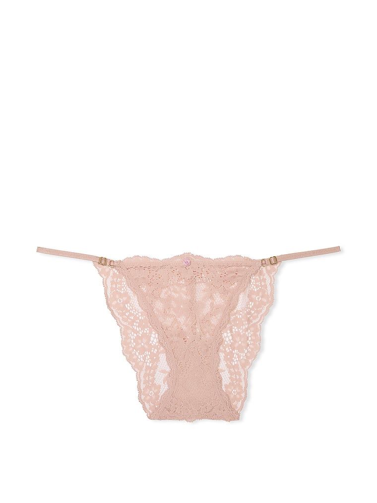 Majtki koronkowe z regulowanymi paskami Bikini. Produkt ma kolor beżowy i pochodzi z kolekcji Dream Angels. 