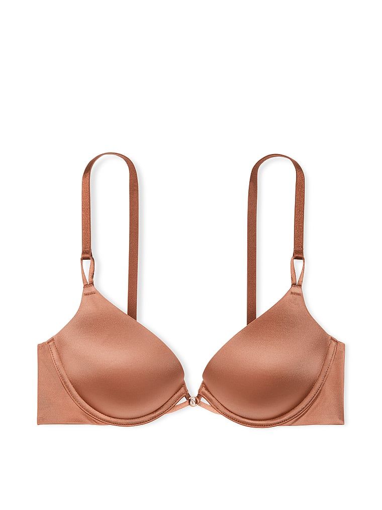 Na zdjęciu na białym tle widoczny jest biustonosz push-up powiększający o 2 rozmiary Bombshell. Produkt ma kolor brązowy i pochodzi z kolekcji Very Sexy.