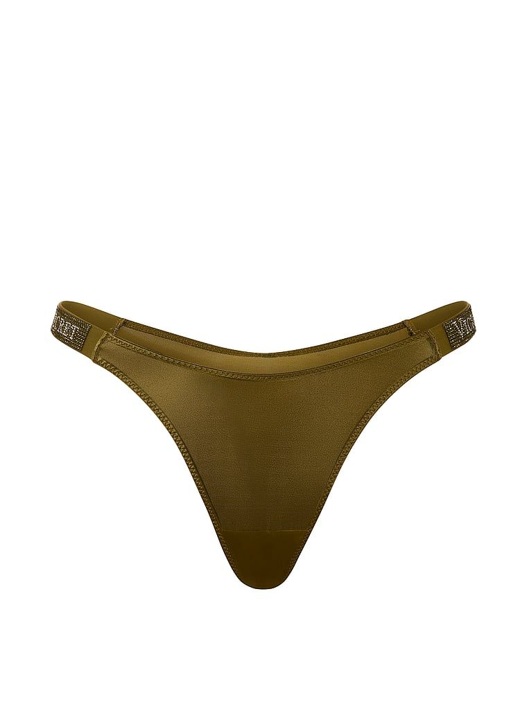 Stringi z błyszczącymi paskami Shine Strap. Produkt ma kolor zielony i pochodzi z kolekcji Very Sexy. 