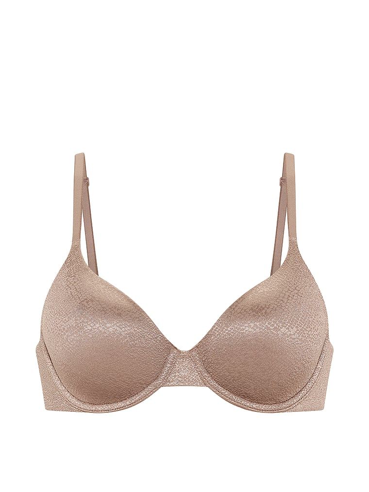 Biustonosz lekko usztywniany z mocno zabudowanymi miseczkami. Produkt ma kolor brązowy i pochodzi z kolekcji Body by Victoria. 