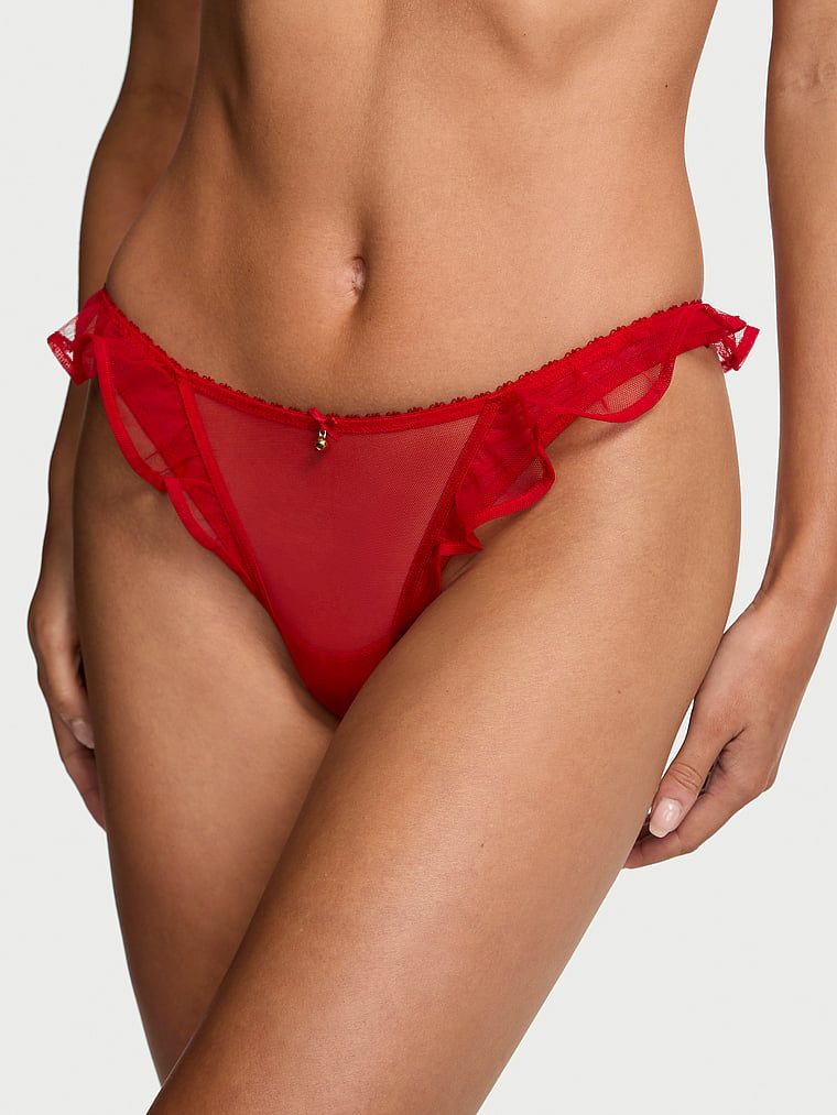 Stringi z falbanką z dzwoneczkami Jingle Belle. Produkt ma kolor czerwony i pochodzi z kolekcji Very Sexy. 