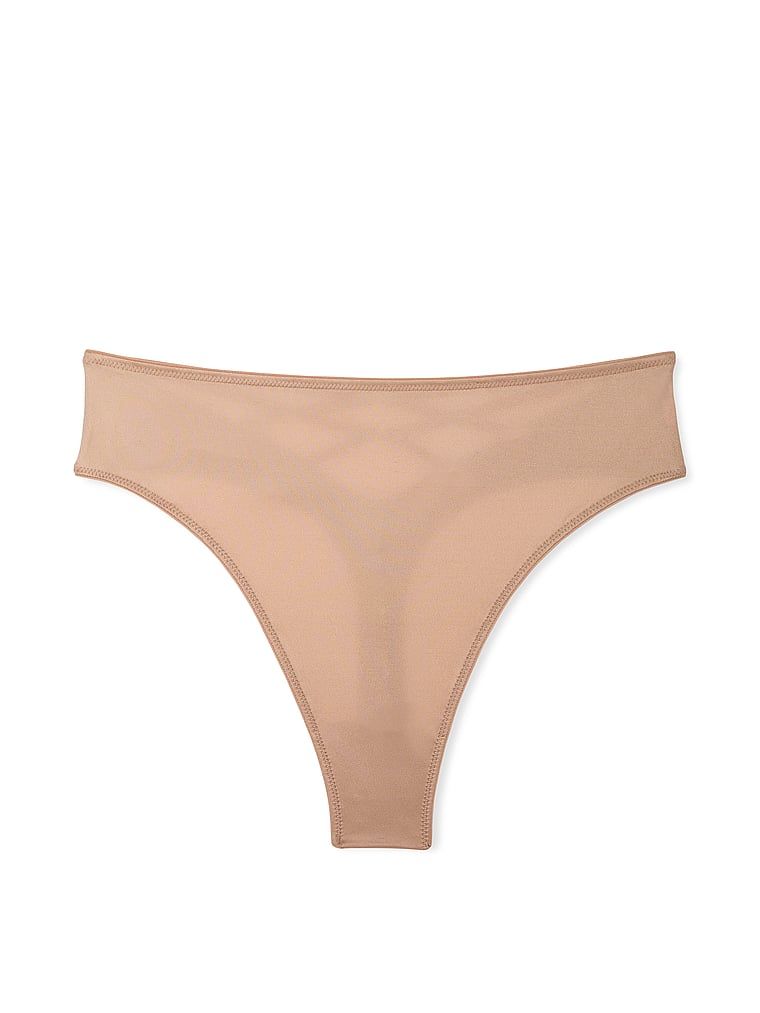Stringi z wysokim stanem i paseczkami z tyłu Strappy-Back. Produkt ma kolor beżowy i pochodzi z kolekcji Very Sexy. 