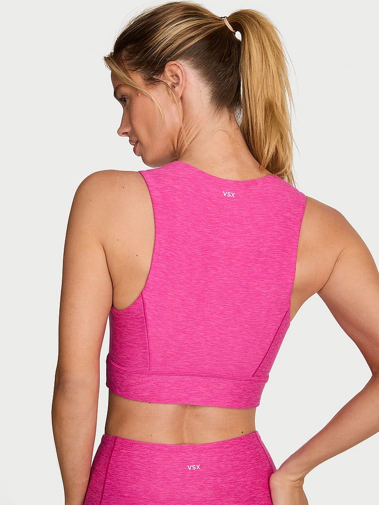 Biustonosz sportowy top VSX New Essential. Produkt ma kolor wzorzysty i pochodzi z kolekcji VSX. 