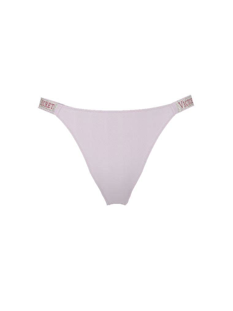 Majtki brazyliany z błyszczącymi paskami Shine Strap Brazilian. Produkt ma kolor fioletowy i pochodzi z kolekcji Very Sexy. 