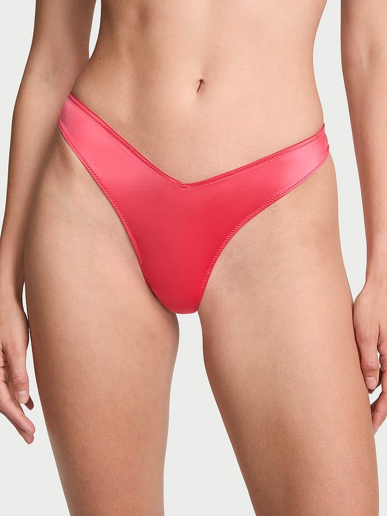 Stringi z paseczkami z tyłu i wysoko wyciętymi nogawkami Strappy-Back High-Leg. Produkt ma kolor czerwony i pochodzi z kolekcji Very Sexy. 