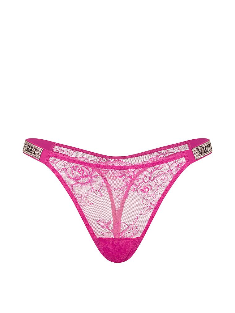 Stringi koronkowe z błyszczącymi paskami Shine Strap. Produkt ma kolor różowy i pochodzi z kolekcji Very Sexy. 