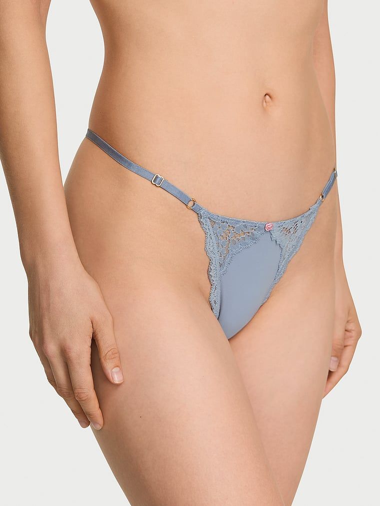 Stringi z koronką z regulowanymi paskami Lace-Trim V-String. Produkt ma kolor niebieski i pochodzi z kolekcji Dream Angels. 