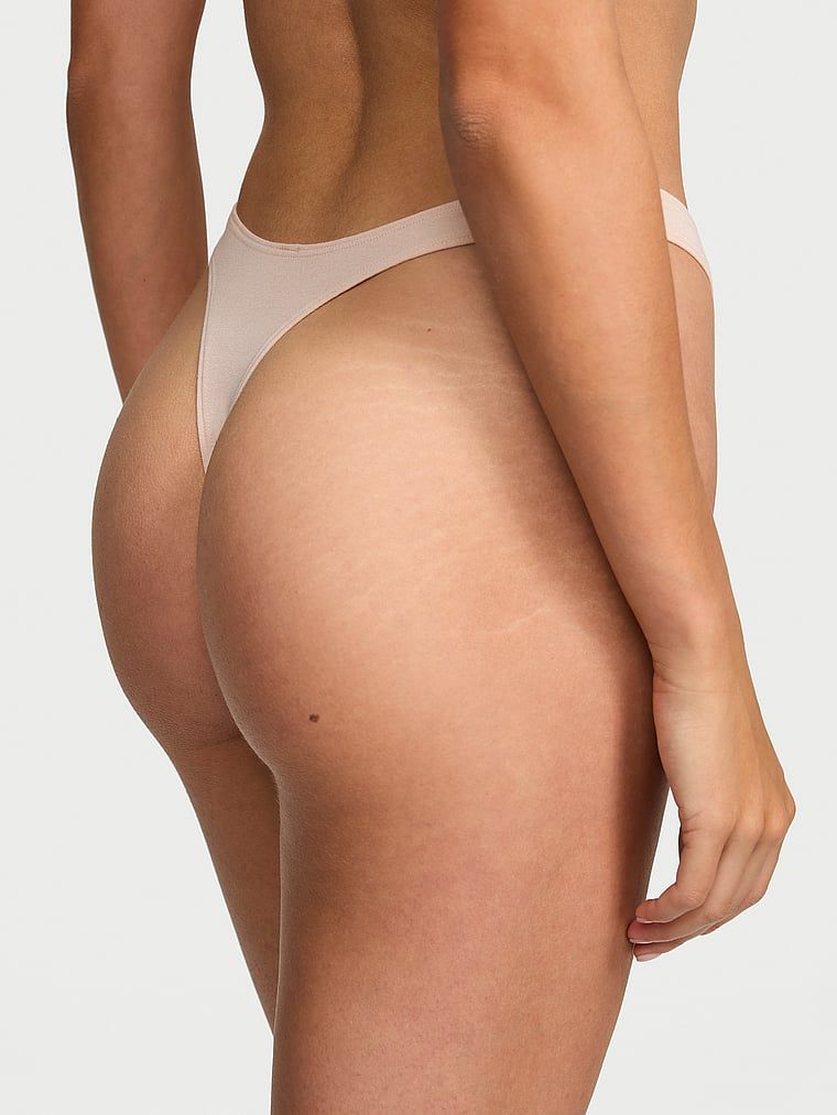Stringi bawełniane High-Leg Scoop. Produkt ma kolor beżowy i pochodzi z kolekcji Victoria's Secret. 
