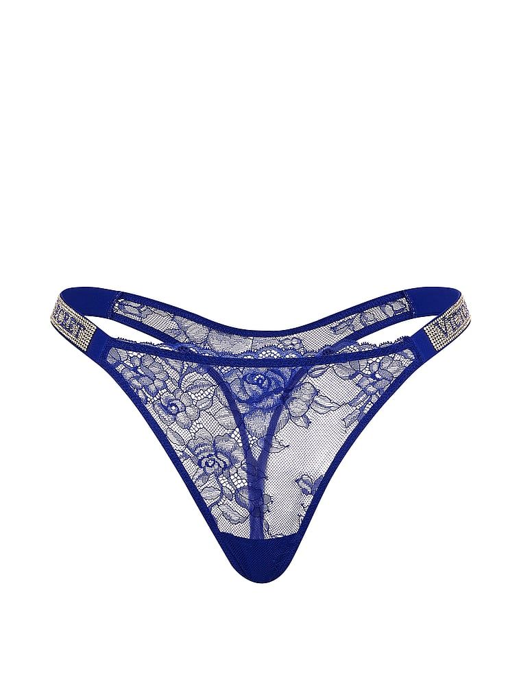 Stringi koronkowe z błyszczącymi paskami Shine Strap. Produkt ma kolor niebieski i pochodzi z kolekcji Very Sexy. 