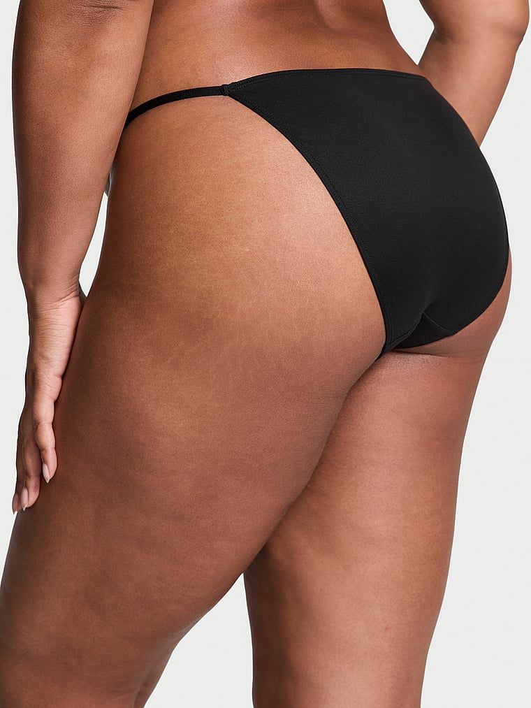 Majtki z regulowanymi paskami Bikini. Produkt ma kolor czarny i pochodzi z kolekcji Dream Angels. 