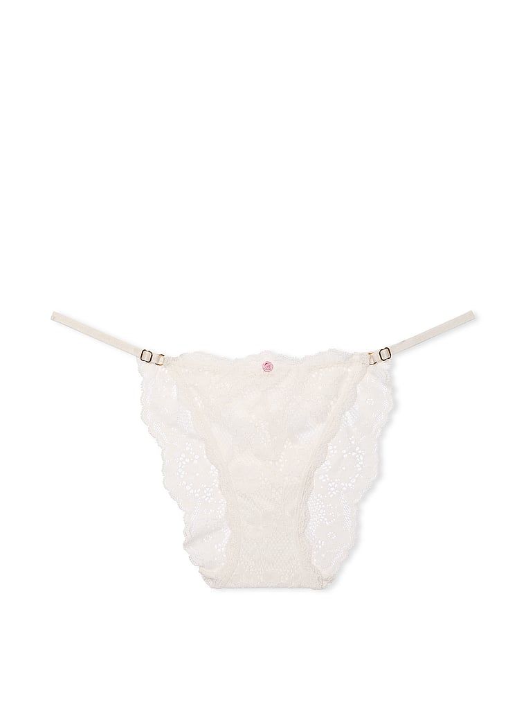 Majtki koronkowe z regulowanymi paskami Bikini. Produkt ma kolor biały i pochodzi z kolekcji Dream Angels. 