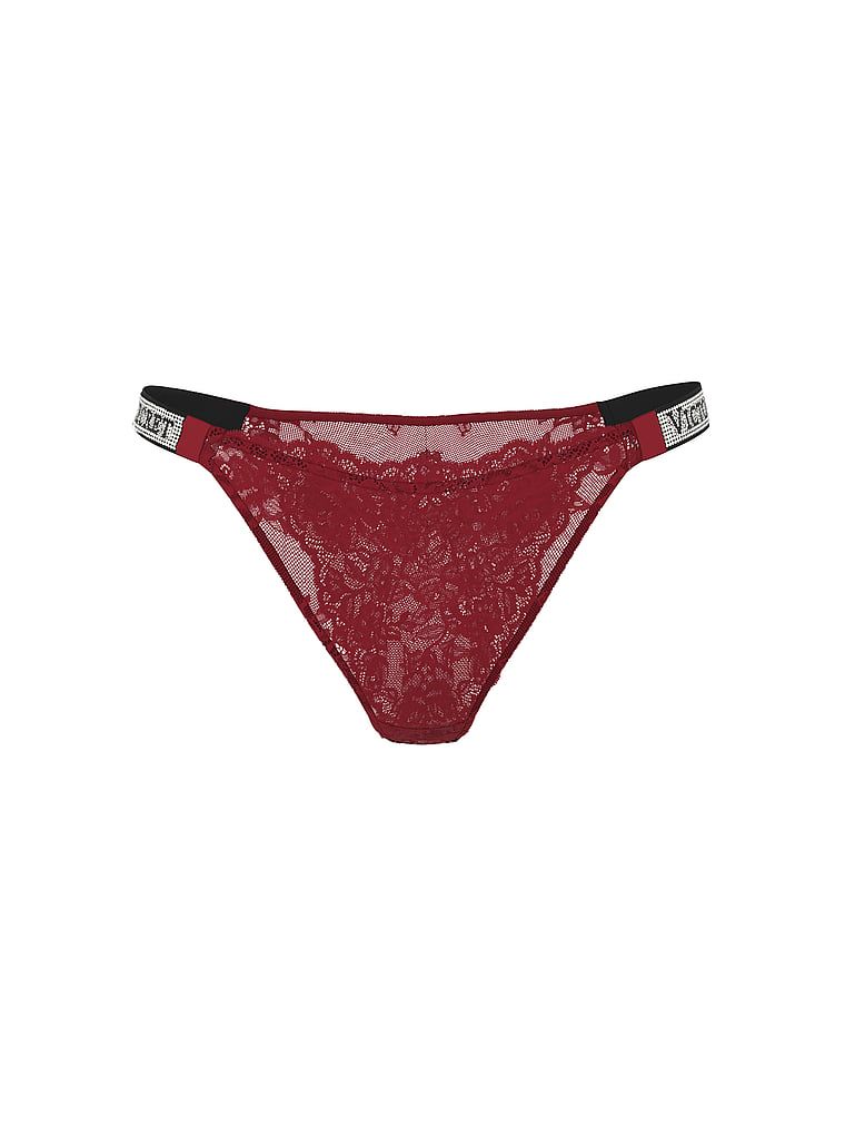 Majtki brazyliany koronkowe z błyszczącymi paskami Shine Strap Brazilian. Produkt ma kolor czerwony i pochodzi z kolekcji Very Sexy. 