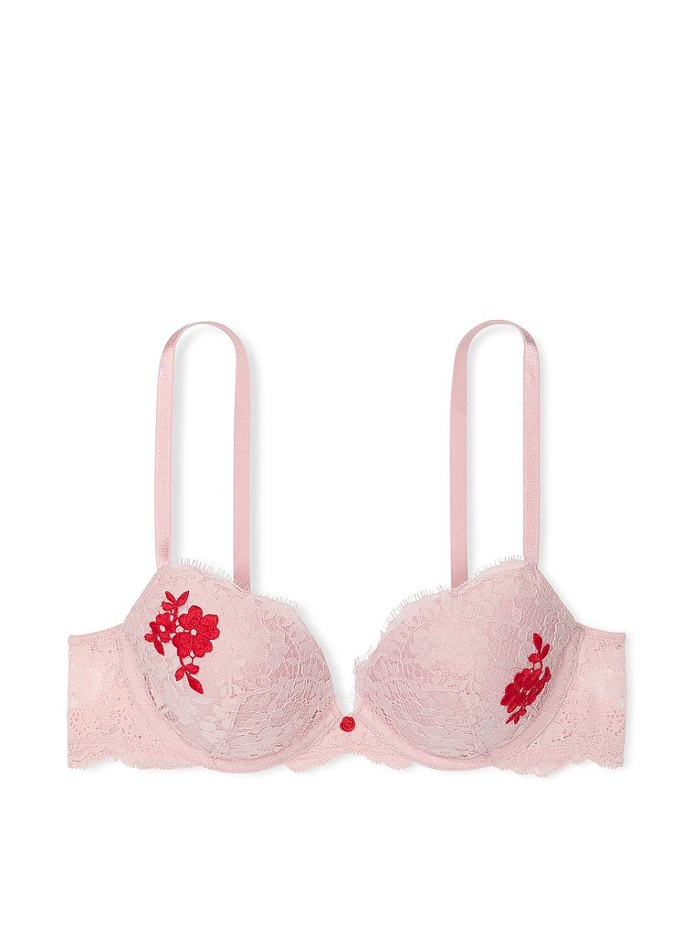 Na zdjęciu na białym tle widoczny jest biustonosz push-up koronkowy Dream Angels. Produkt ma kolor różowy i pochodzi z kolekcji Dream Angels.