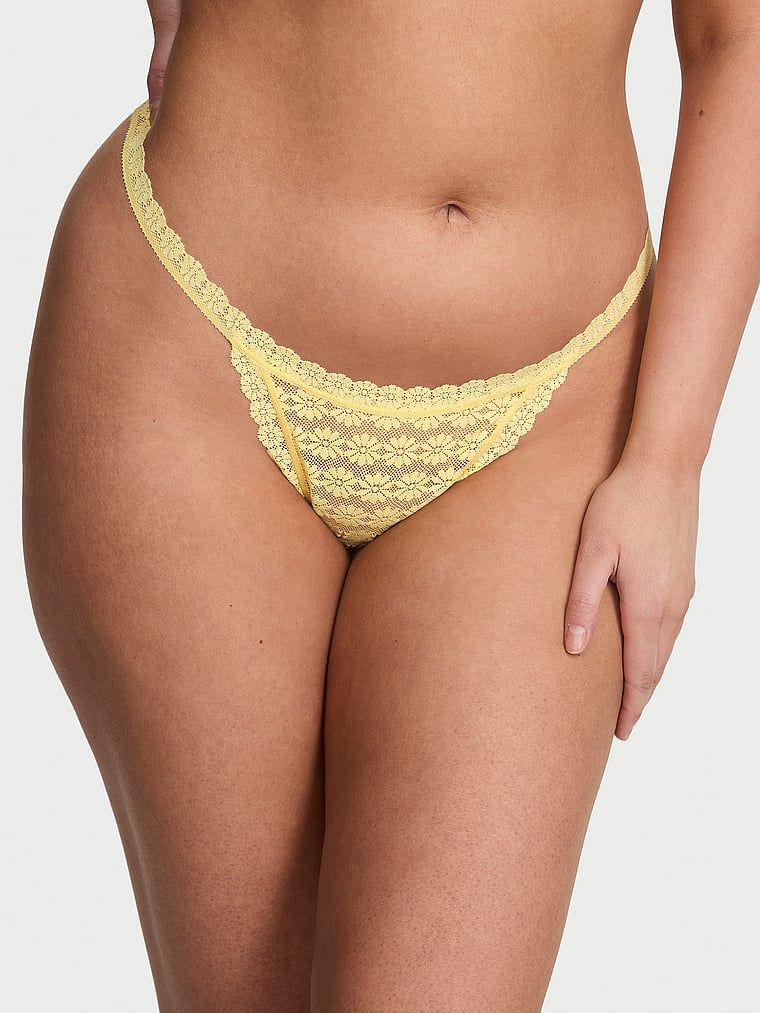 Stringi koronkowe Daisy. Produkt ma kolor żółty i pochodzi z kolekcji Lacie. 