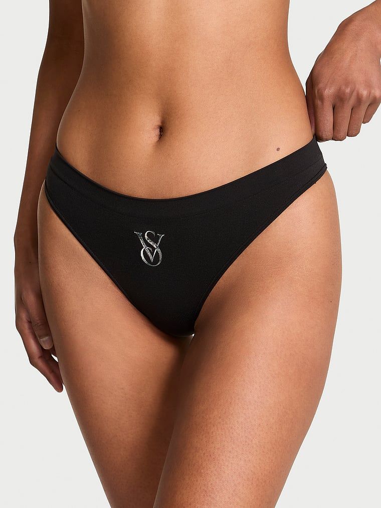 Stringi bezszwowe z błyszczącym logo Sparkle. Produkt ma kolor czarny i pochodzi z kolekcji Seamless. 