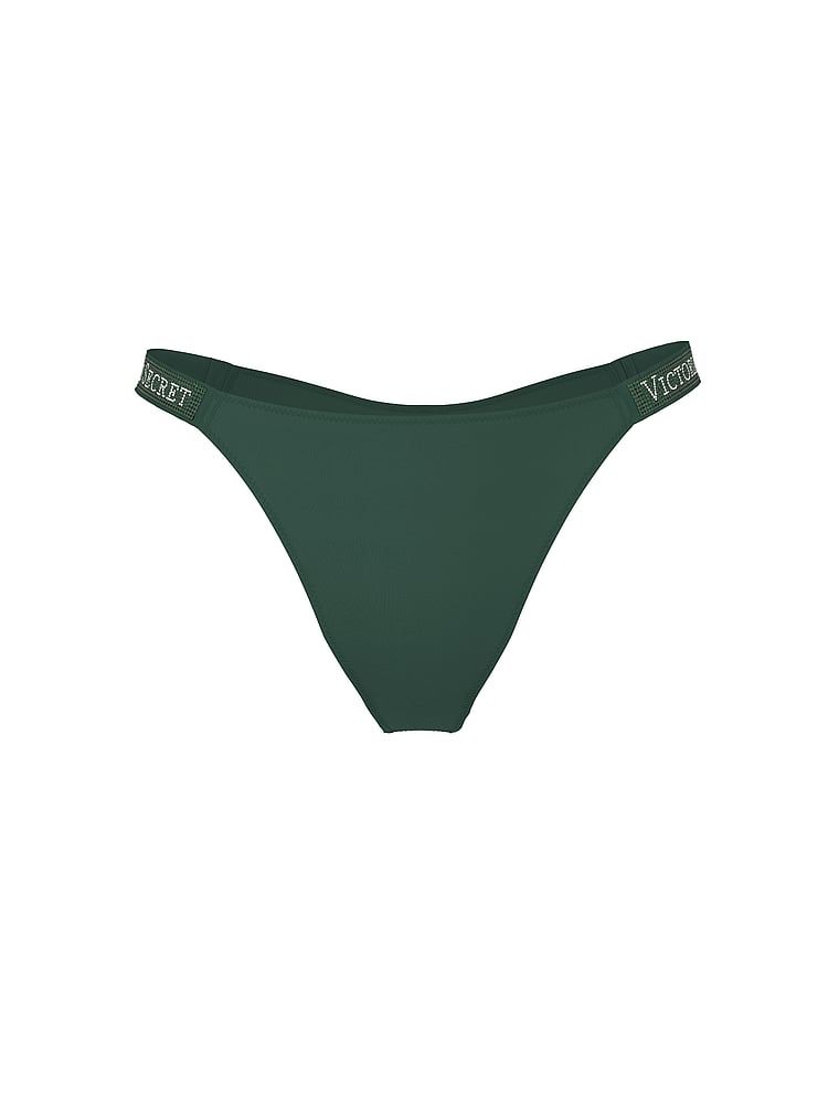 Majtki brazyliany z błyszczącymi paskami Shine Strap Brazilian. Produkt ma kolor zielony i pochodzi z kolekcji Very Sexy. 