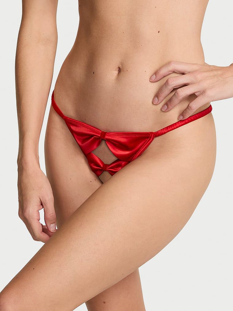 Stringi bez kroku Satin Bow. Produkt ma kolor czerwony i pochodzi z kolekcji Dream Angels. 