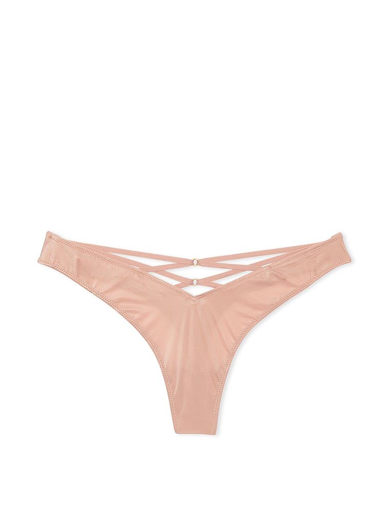 Stringi z paseczkami z tyłu i wysoko wyciętymi nogawkami Strappy-Back High-Leg. Produkt ma kolor beżowy i pochodzi z kolekcji Very Sexy. 