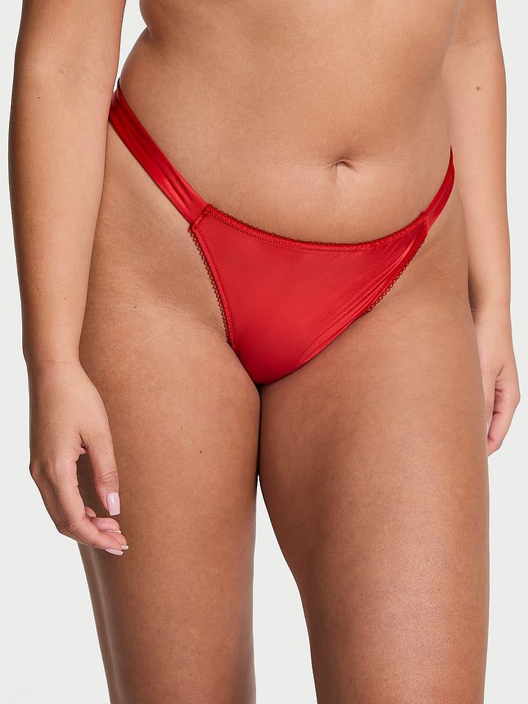 Stringi z pomponami Pom Pom Bow. Produkt ma kolor czerwony i pochodzi z kolekcji Dream Angels. 