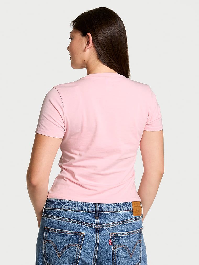 T-shirt bawełniany VSFS 2025. Produkt ma kolor różowy i pochodzi z kolekcji Angel Essentials. 