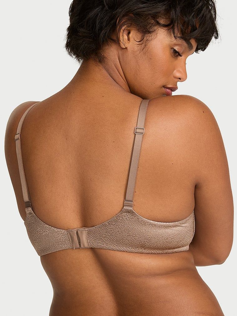 Biustonosz lekko usztywniany Demi. Produkt ma kolor brązowy i pochodzi z kolekcji Body by Victoria. 