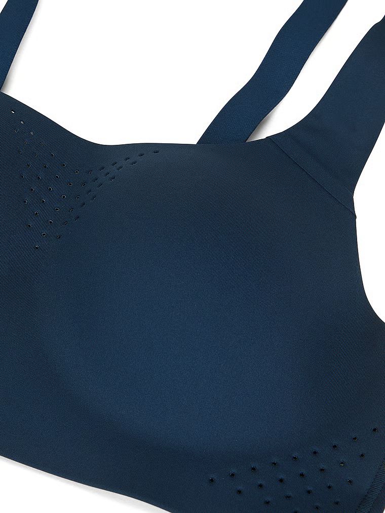 Biustonosz sportowy z maksymalnym podtrzymaniem Featherweight Max. Produkt ma kolor niebieski i pochodzi z kolekcji VSX. 