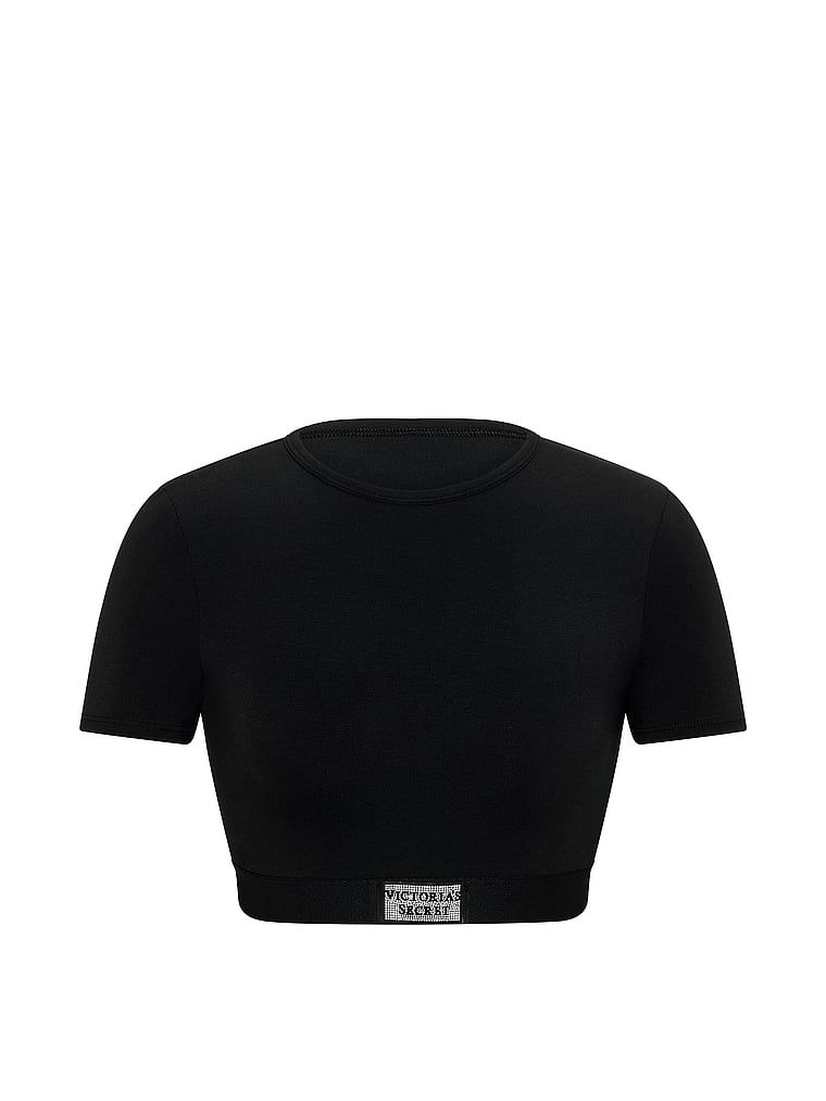 Crop top bawełniany braletka z krótkimi rękawami Shine Patch. Produkt ma kolor czarny i pochodzi z kolekcji T-shirt. 