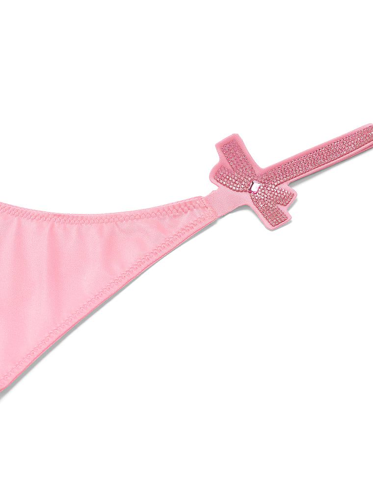 Stringi Shine Bow. Produkt ma kolor różowy i pochodzi z kolekcji Very Sexy. 