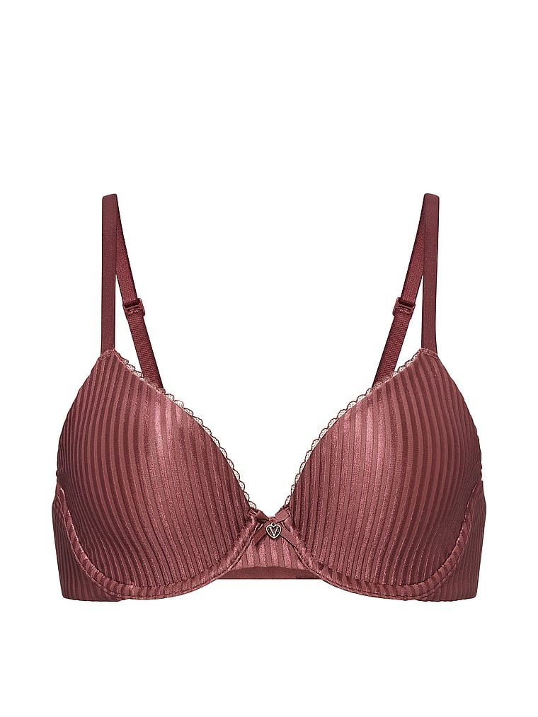 Biustonosz nieusztywniany Invisible Lift Demi. Produkt ma kolor różowy i pochodzi z kolekcji Body by Victoria. 