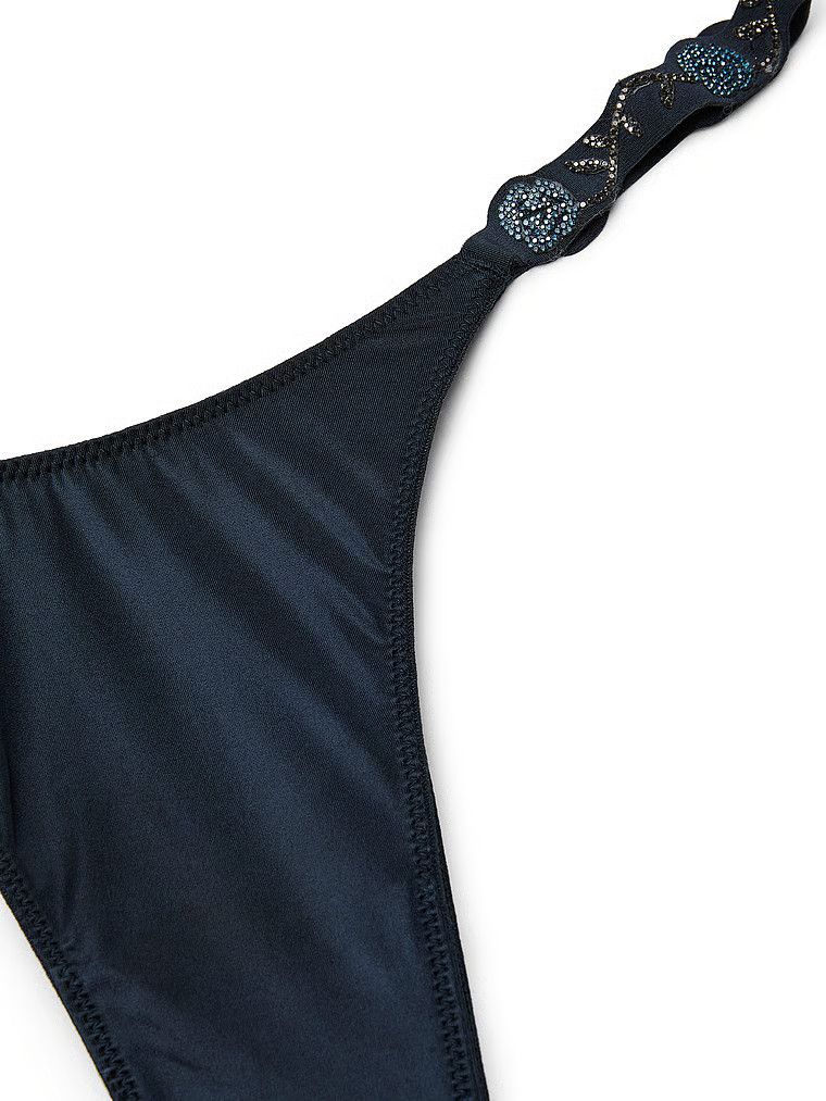 Majtki brazyliany z błyszczącymi paskami Electric Orchid Shine Strap Brazilian. Produkt ma kolor niebieski i pochodzi z kolekcji Body by Victoria.
