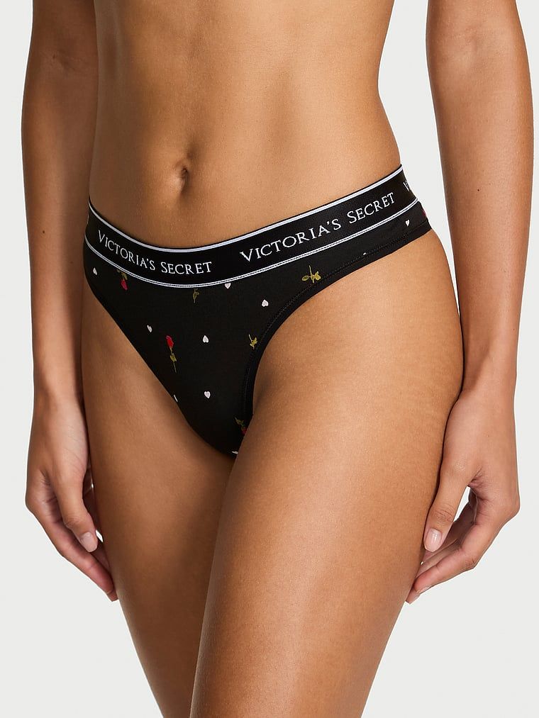 Stringi bawełniane z logo w talii. Produkt ma kolor kwiatowe i pochodzi z kolekcji Cotton. 