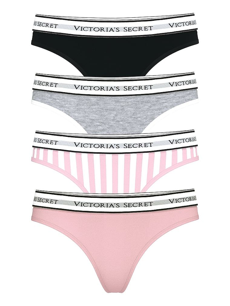 Zestaw stringów bawełnianych z logo - 4 sztuki. Produkt jest wzorzysty i pochodzi z kolekcji Victoria's Secret. 