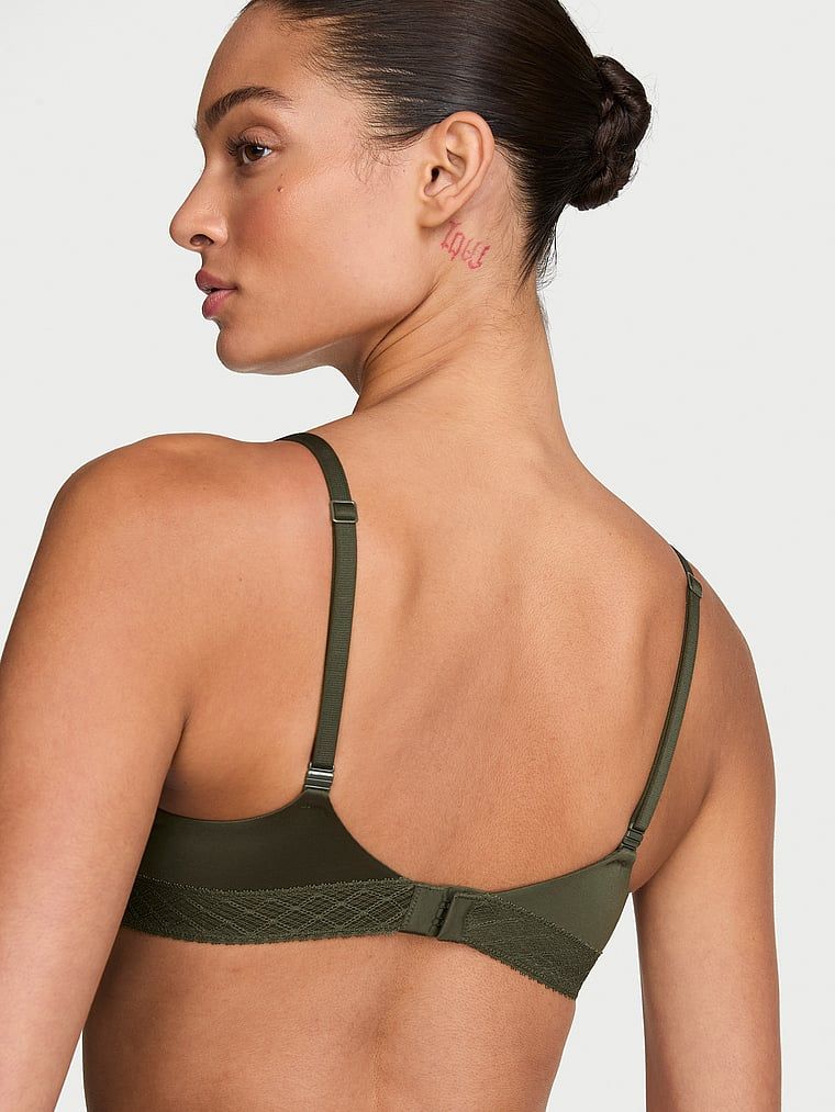 Biustonosz lekko usztywniany ze wstawkami z koronki Demi. Produkt ma kolor zielony i pochodzi z kolekcji Body by Victoria. 
