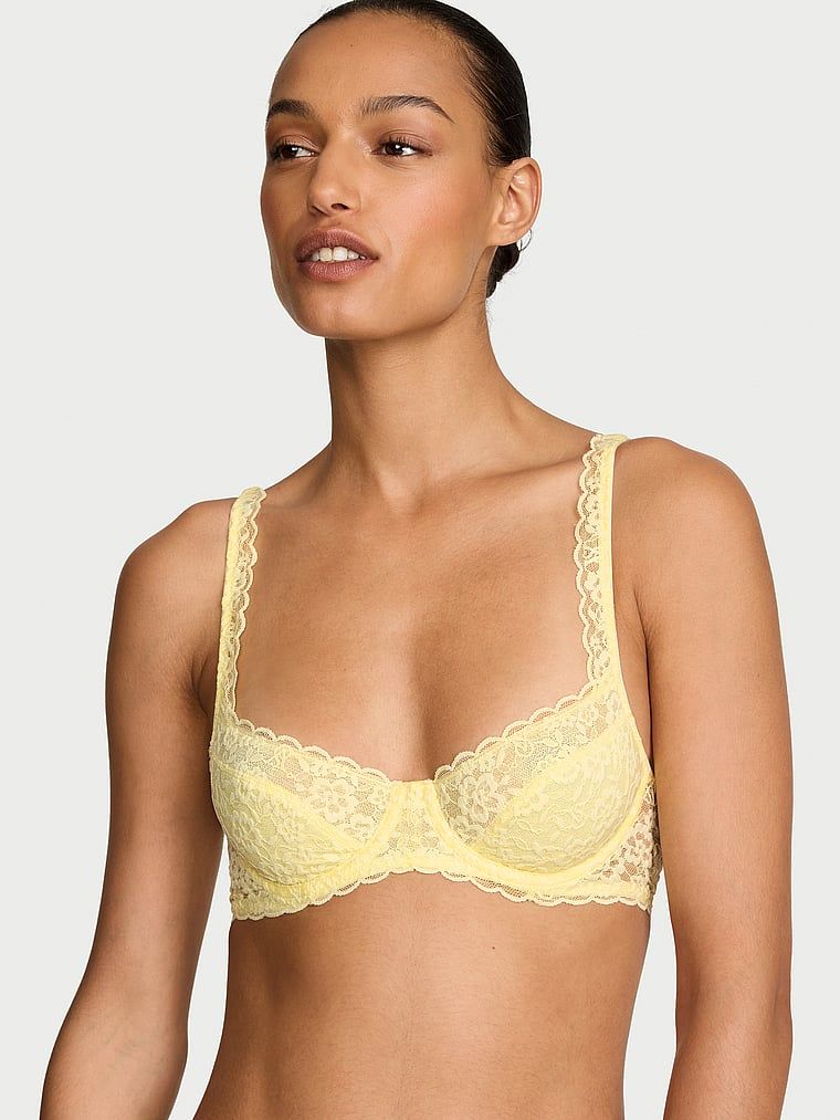 Biustonosz nieusztywniany balkonetka koronkowy. Produkt ma kolor żółty i pochodzi z kolekcji Victoria's Secret. 