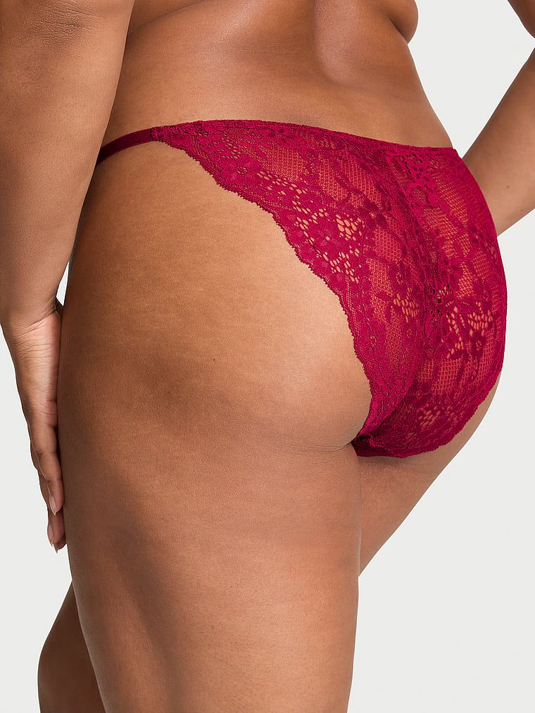Majtki bikini koronkowe z regulowanymi paskami. Produkt ma kolor czerwony i pochodzi z kolekcji Dream Angels. 