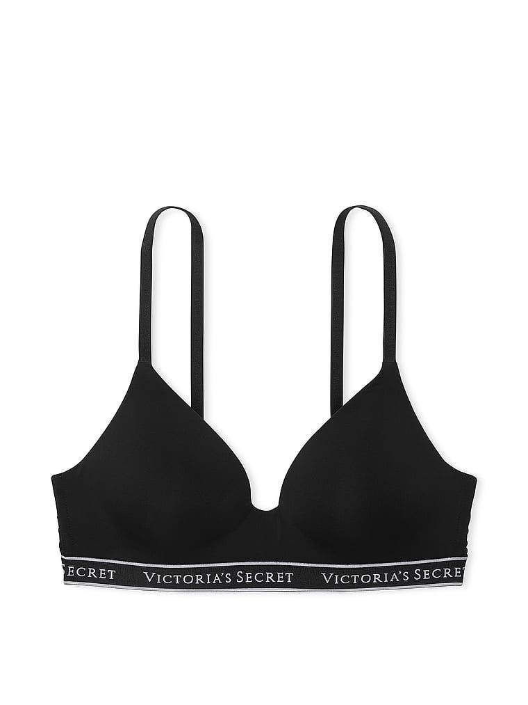 Na zdjęciu na białym tle widoczny jest biustonosz lekko usztywniany bez fiszbin z koronką Wireless Lace-Trim. Produkt ma kolor czarny i pochodzi z kolekcji T-shirt.