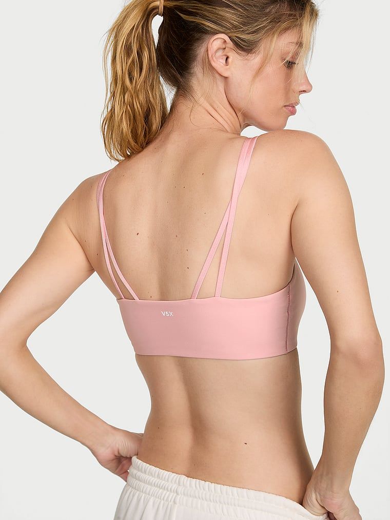 Biustonosz sportowy VSX Elevate. Produkt ma kolor różowy i pochodzi z kolekcji VSX. 