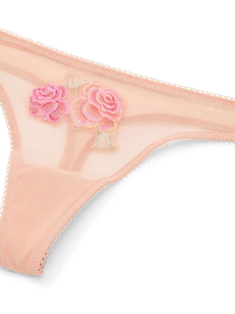 Stringi z siateczki Sweet Melody. Produkt ma kolor beżowy i pochodzi z kolekcji Dream Angels. 