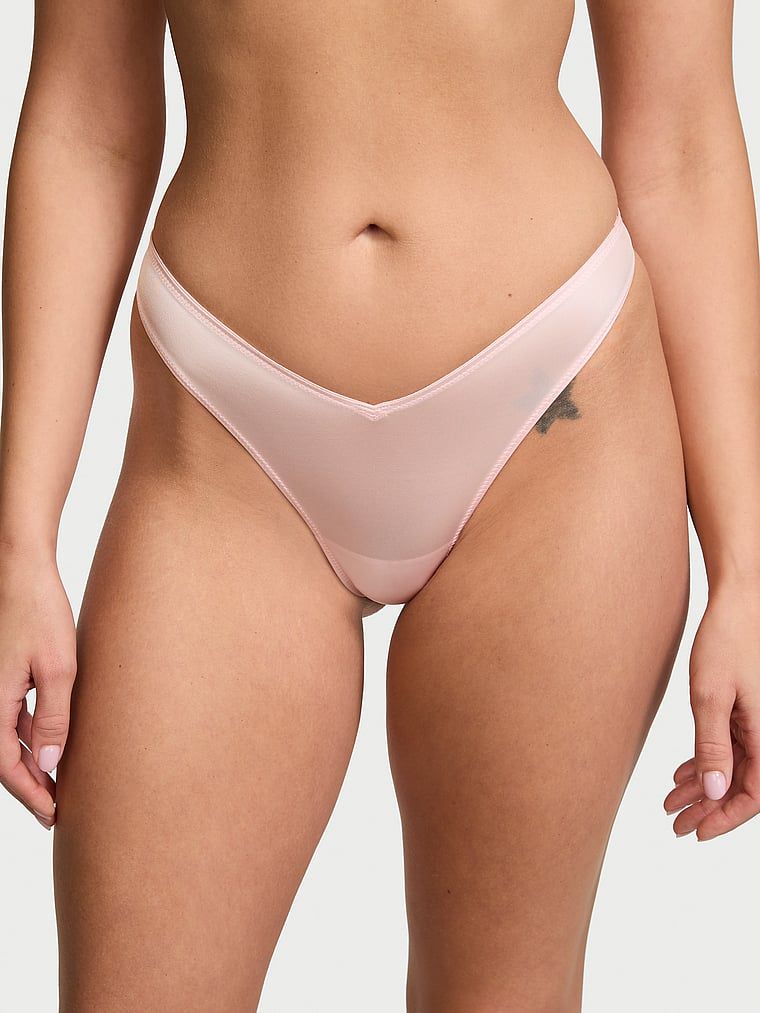 Stringi z paseczkami z tyłu i wysoko wyciętymi nogawkami Strappy-Back High-Leg. Produkt ma kolor różowy i pochodzi z kolekcji Very Sexy. 
