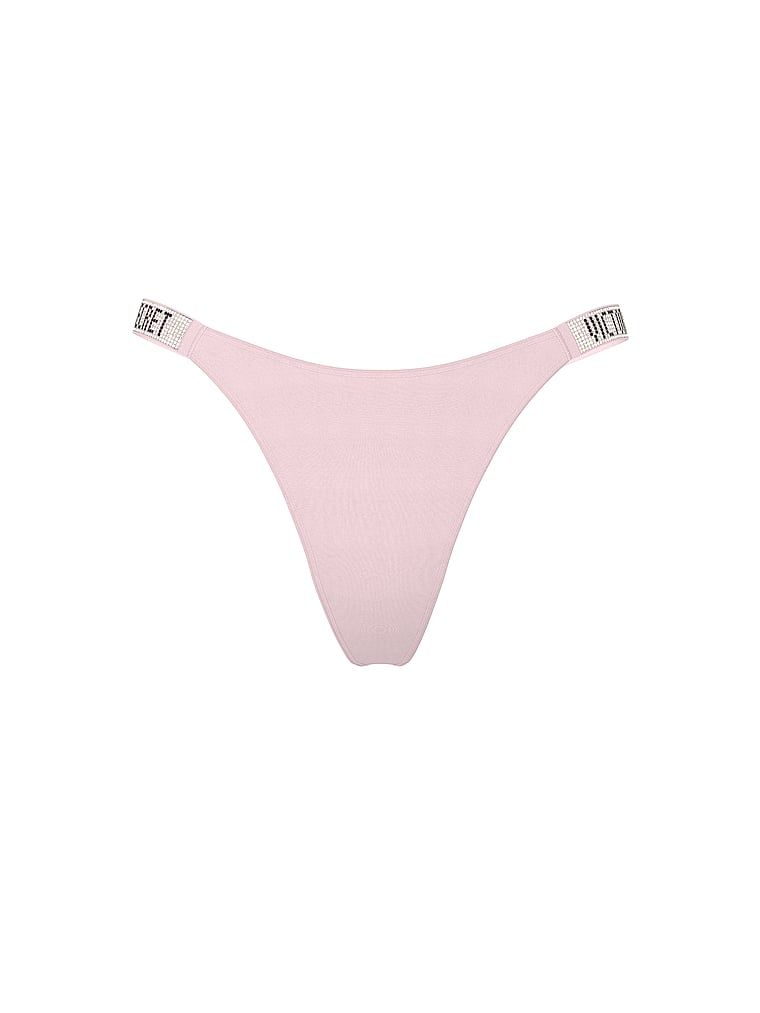 Stringi z błyszczącymi paskami Shine Strap. Produkt ma kolor różowy i pochodzi z kolekcji Very Sexy. 