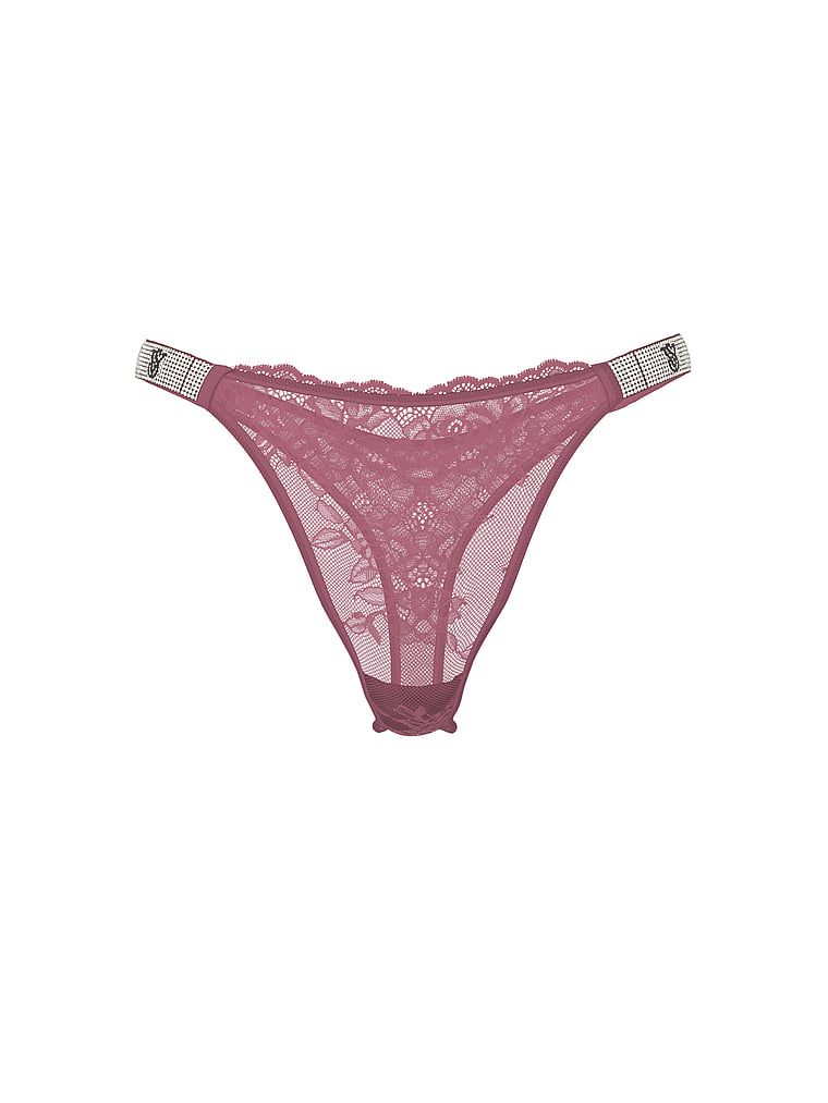 Stringi koronkowe z błyszczącymi paskami Shine Strap Rose Lace. Produkt ma kolor purpurowy i pochodzi z kolekcji Very Sexy. 